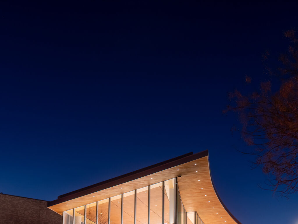 The top of a building and the night sky.